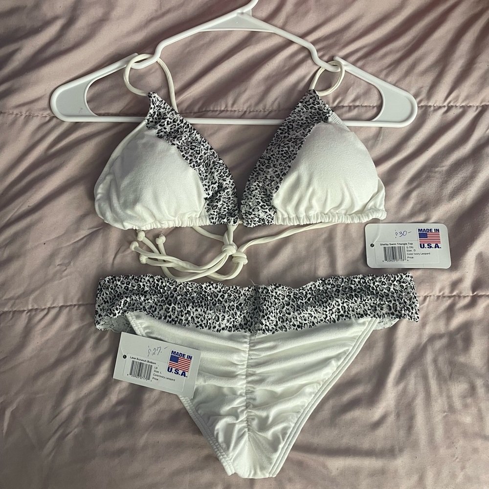 Two piece white swimsuit with leopard print lace trim